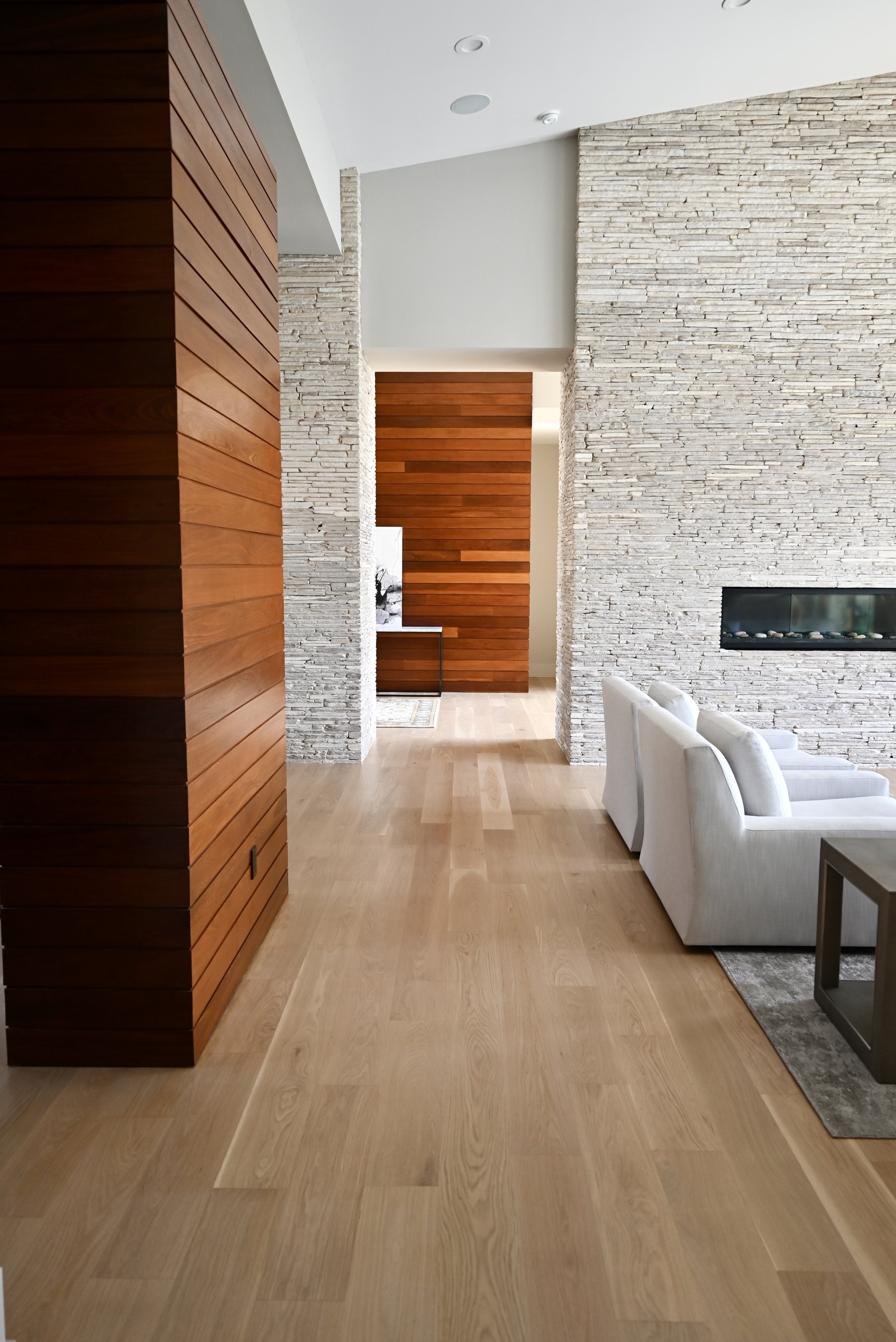 Luxury engineered hardwood flooring installed throughout new construction Bee Cave home by C & C Flooring Co.